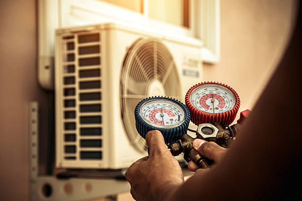 Professional Emergency Hvac technician working in Camp Hill, PA